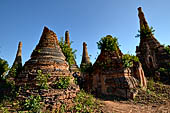 Inle Lake Myanmar. Indein, a cluster of ancient stupas  ruined and overgrown with bushes, just behind the village. 